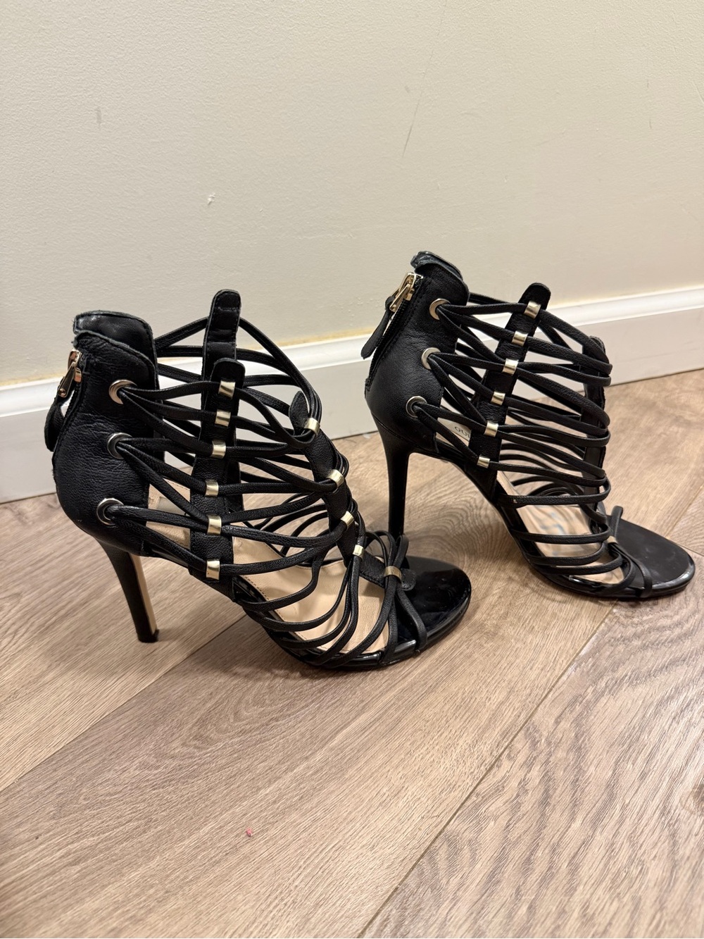 Black Guess Strappy High Heel Sandals with Gold Accents